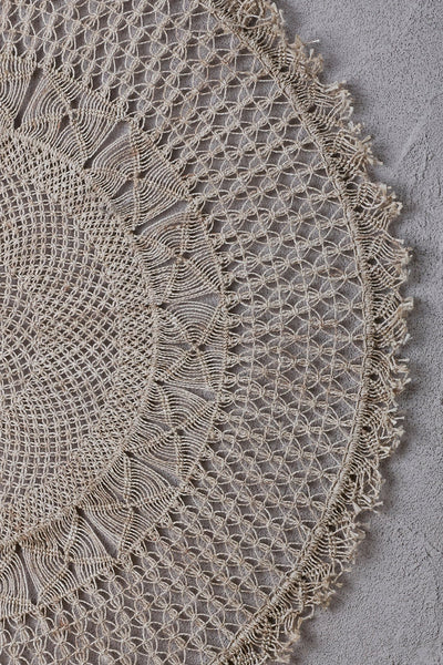 detail of jute wall hanging in macramé woven in circular rows