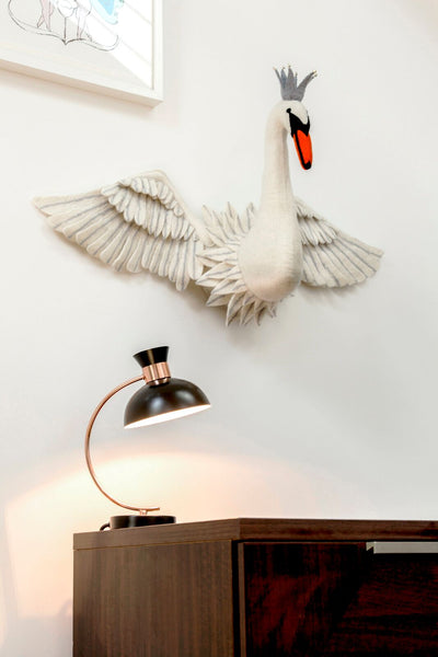 swan head with wings above desk sew heart felt